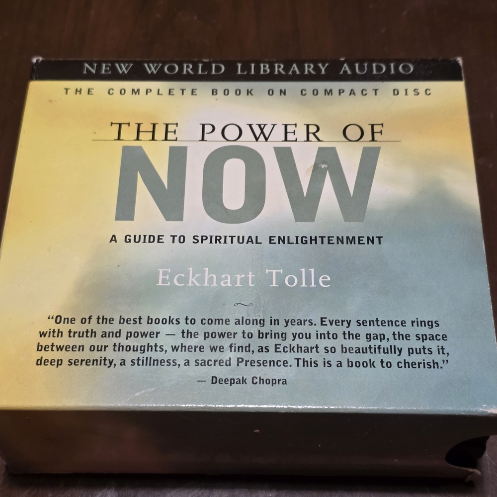 The Power of Now: A Guide to Spiritual Enlightenment by Eckhart Tolle. Audiobook